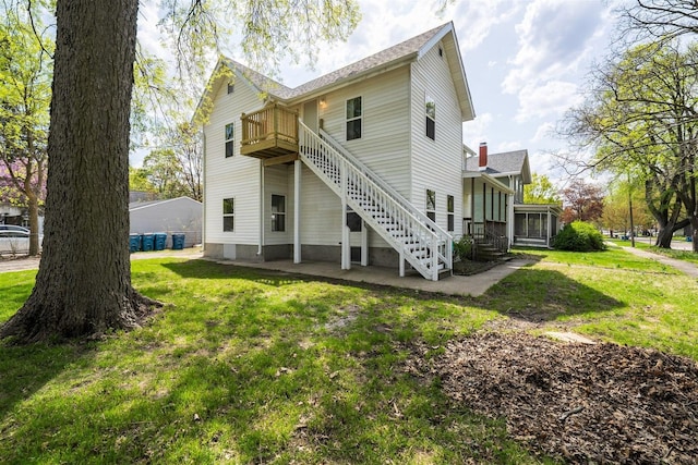 510 E Washington St, Pontiac, IL 61764 - back of house with a yard and stairway