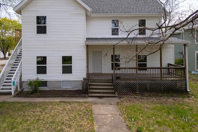 510 E Washington St, Pontiac, IL 61764 - view of front of house with stairway, roof with shingles, a porch, and a front yard