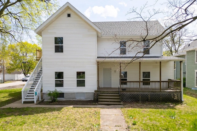 510 E Washington St, Pontiac, IL 61764 - view of front of home featuring stairs, a porch, a shingled roof, and a front lawn