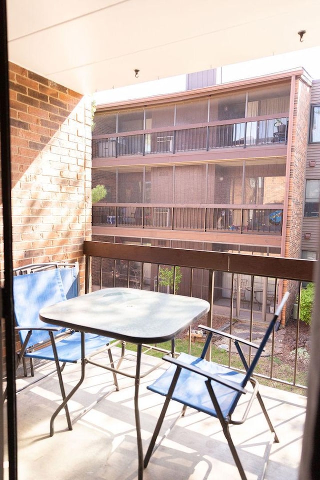 balcony featuring outdoor dining area