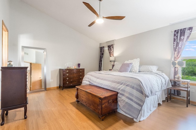 1518 Parkside Dr, Plainfield, IL 60586 - bedroom featuring high vaulted ceiling, ceiling fan, baseboards, and light wood-type flooring