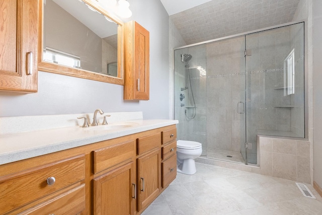 1518 Parkside Dr, Plainfield, IL 60586 - full bath with toilet, vanity, visible vents, tile patterned flooring, and a shower stall