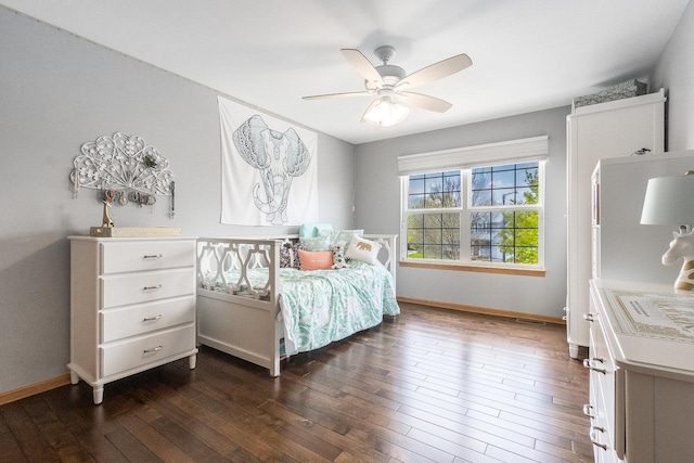 1518 Parkside Dr, Plainfield, IL 60586 - bedroom featuring dark wood-style flooring, baseboards, and a ceiling fan