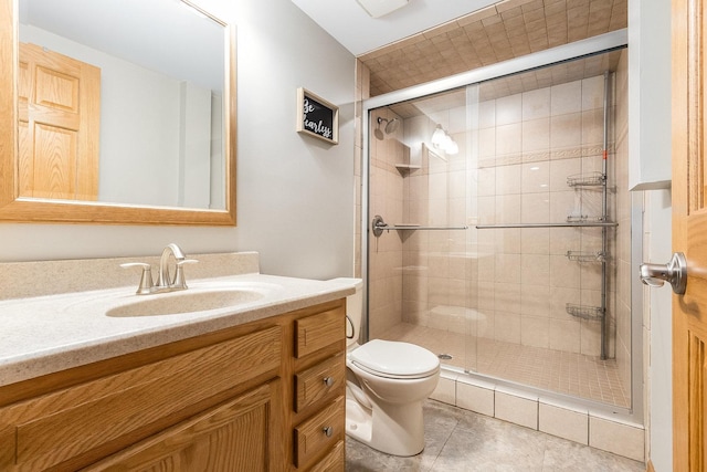 1518 Parkside Dr, Plainfield, IL 60586 - full bathroom with a stall shower, vanity, toilet, and tile patterned flooring