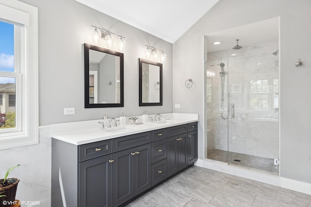 236 W Crescent Ave, Elmhurst, IL 60126 - full bathroom with lofted ceiling, healthy amount of natural light, a marble finish shower, and double vanity
