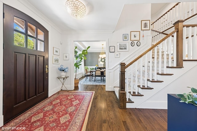 236 W Crescent Ave, Elmhurst, IL 60126 - entrance foyer featuring a chandelier, stairway, wood finished floors, crown molding, and baseboards