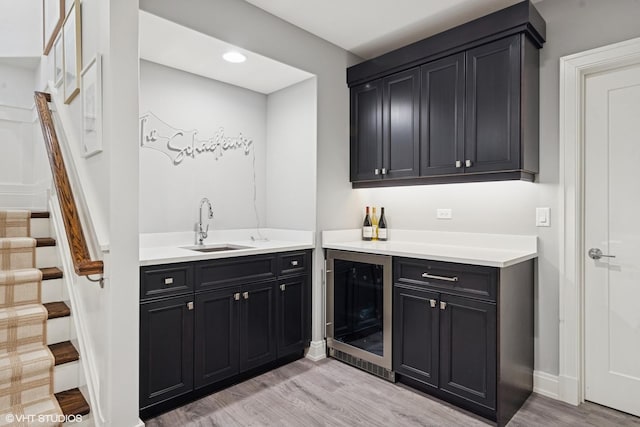 236 W Crescent Ave, Elmhurst, IL 60126 - indoor wet bar with wine cooler, light wood-style flooring, stairway, baseboards, and recessed lighting