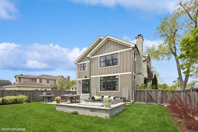236 W Crescent Ave, Elmhurst, IL 60126 - rear view of house with board and batten siding, a chimney, a patio, and outdoor lounge area