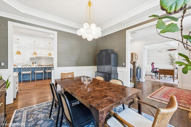 236 W Crescent Ave, Elmhurst, IL 60126 - dining area with a chandelier, wood finished floors, ornamental molding, and wainscoting