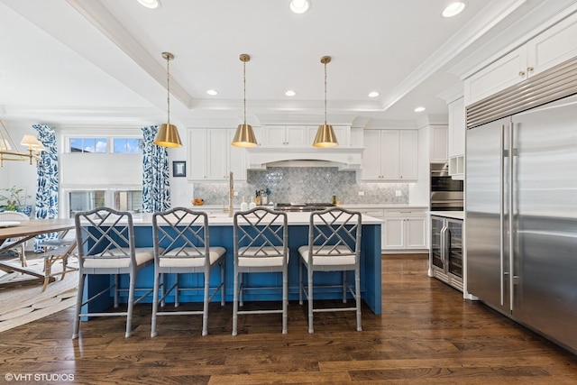236 W Crescent Ave, Elmhurst, IL 60126 - kitchen featuring appliances with stainless steel finishes, wine cooler, a raised ceiling, white cabinets, and crown molding