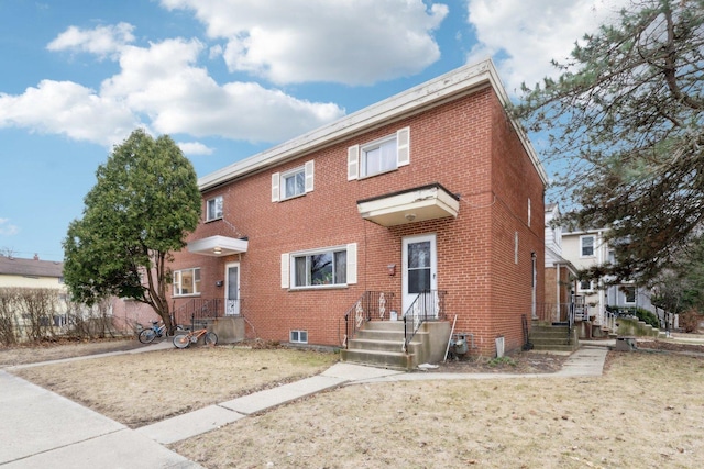 2122 Foster St, Evanston, IL 60201 - view of front of property featuring brick siding