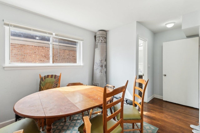 2122 Foster St, Evanston, IL 60201 - dining area featuring baseboards and wood finished floors