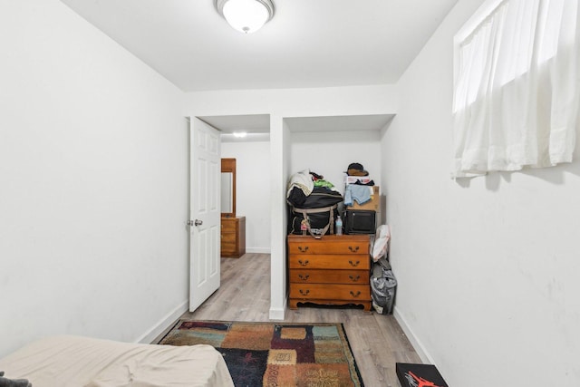 2122 Foster St, Evanston, IL 60201 - bedroom with wood finished floors and baseboards