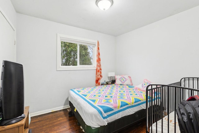 2122 Foster St, Evanston, IL 60201 - bedroom with wood finished floors and baseboards