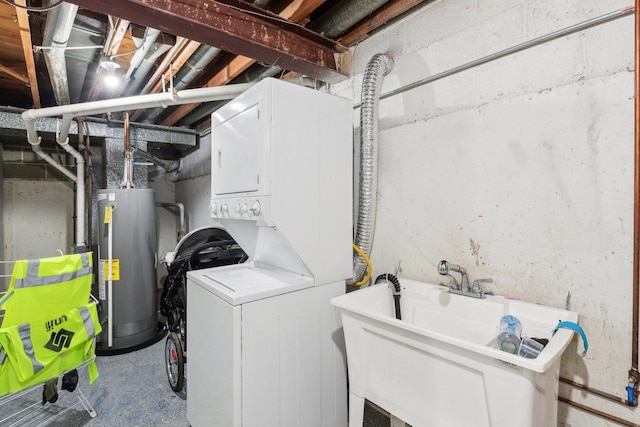 2122 Foster St, Evanston, IL 60201 - washroom with gas water heater, a sink, stacked washing maching and dryer, and laundry area