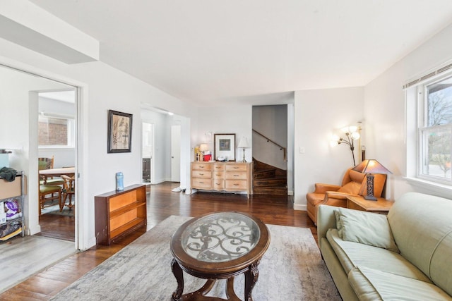 2122 Foster St, Evanston, IL 60201 - living room featuring dark wood finished floors, stairway, and baseboards