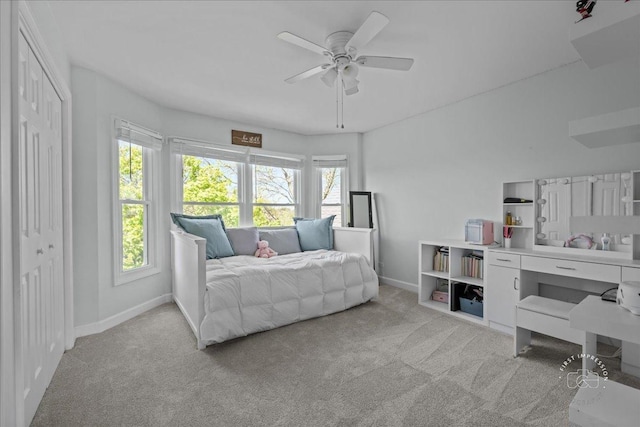 6N372 E Ridgewood Dr, Saint Charles, IL 60175 - carpeted bedroom featuring multiple windows, baseboards, a ceiling fan, and a closet