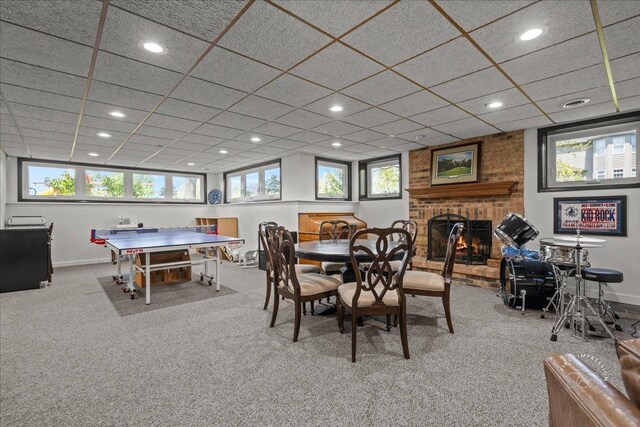 6N372 E Ridgewood Dr, Saint Charles, IL 60175 - recreation room with a brick fireplace, carpet, baseboards, and recessed lighting