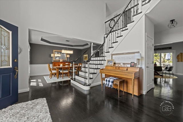 6N372 E Ridgewood Dr, Saint Charles, IL 60175 - foyer with stairway, baseboards, wood finished floors, and a chandelier