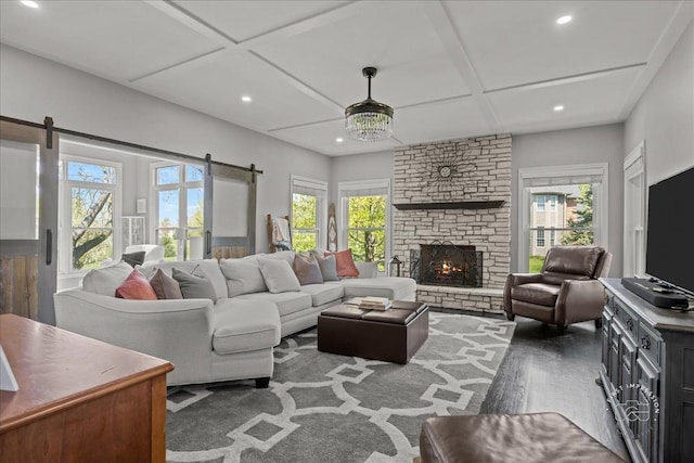6N372 E Ridgewood Dr, Saint Charles, IL 60175 - living area with recessed lighting, a barn door, coffered ceiling, wood finished floors, and a fireplace
