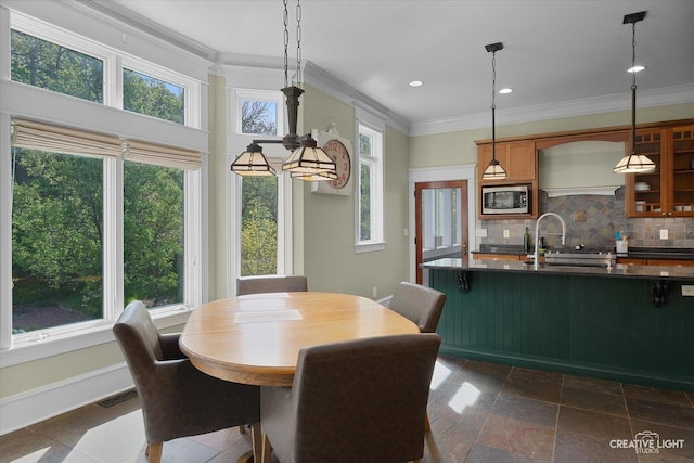 5900G Red Gate Ln, Yorkville, IL 60560 - dining space featuring ornamental molding, recessed lighting, stone tile flooring, and baseboards