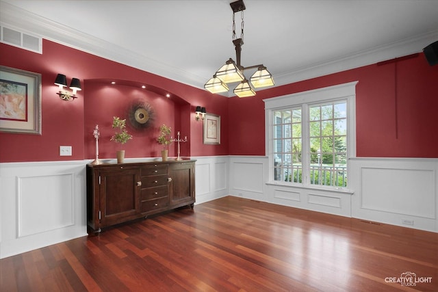 5900G Red Gate Ln, Yorkville, IL 60560 - bar with a wainscoted wall, dark wood-type flooring, a decorative wall, crown molding, and decorative light fixtures