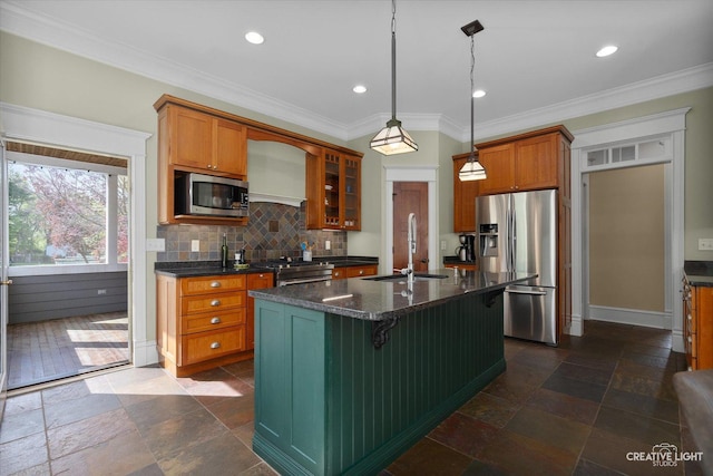 5900G Red Gate Ln, Yorkville, IL 60560 - kitchen with appliances with stainless steel finishes, a sink, stone tile flooring, brown cabinets, and recessed lighting