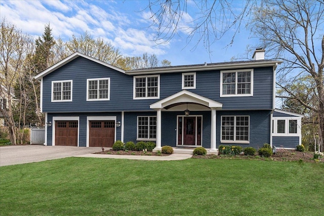 130 Ravine Forest Dr, Lake Bluff, IL 60044 - view of front of home featuring a chimney, a garage, a front lawn, and driveway