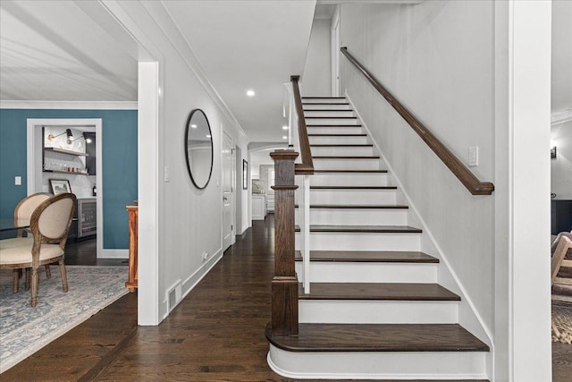 130 Ravine Forest Dr, Lake Bluff, IL 60044 - stairs with ornamental molding, visible vents, wood finished floors, and baseboards