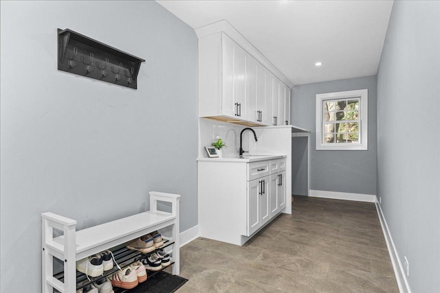 130 Ravine Forest Dr, Lake Bluff, IL 60044 - interior space with baseboards and a sink