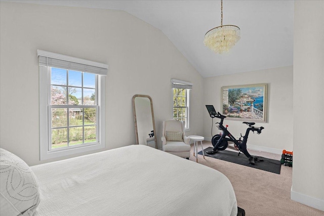 130 Ravine Forest Dr, Lake Bluff, IL 60044 - carpeted bedroom with a chandelier, vaulted ceiling, and baseboards