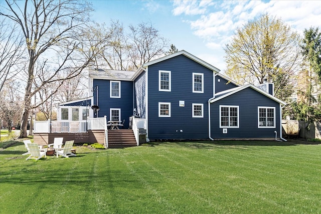130 Ravine Forest Dr, Lake Bluff, IL 60044 - rear view of property featuring a yard and a wooden deck