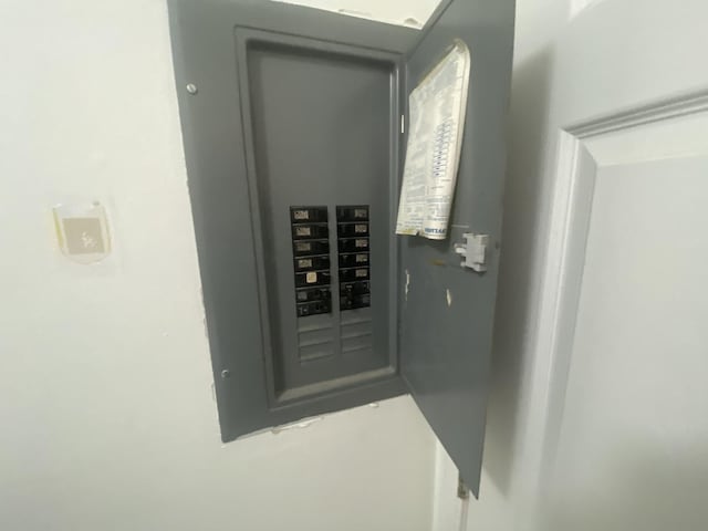 utility room featuring electric panel