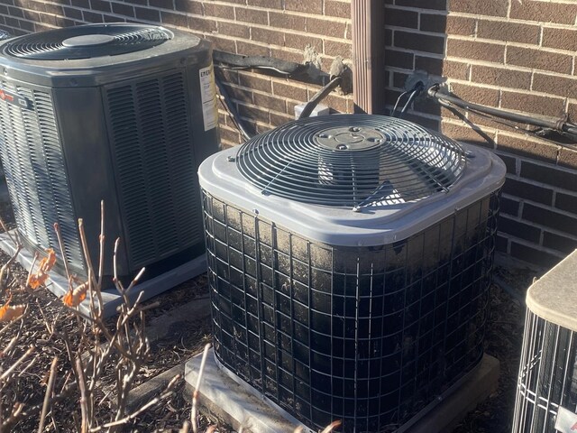 details with central AC and brick siding