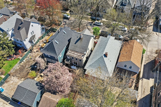 birds eye view of property with a residential view