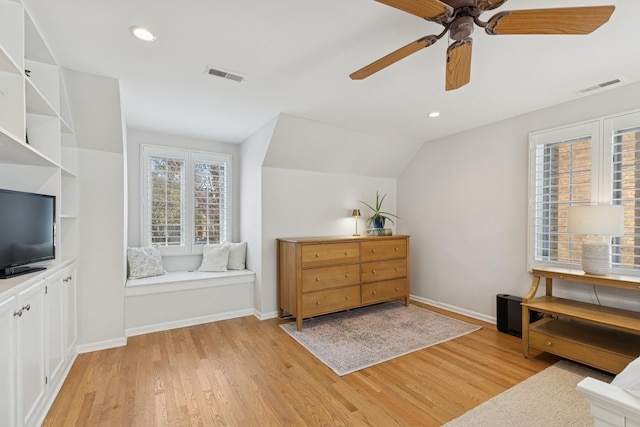 sitting room with visible vents, a ceiling fan, and light wood-style floors