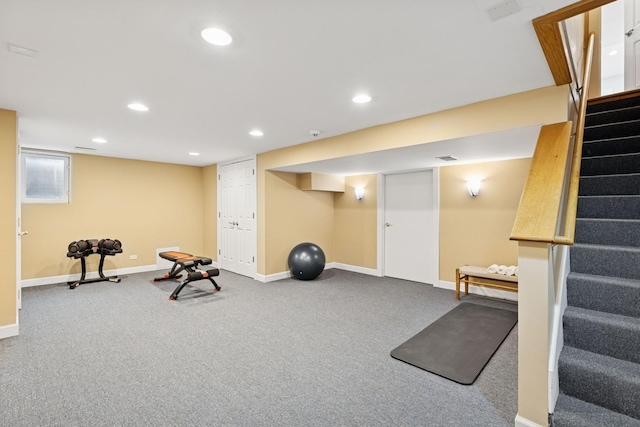 exercise room with baseboards, carpet flooring, and recessed lighting