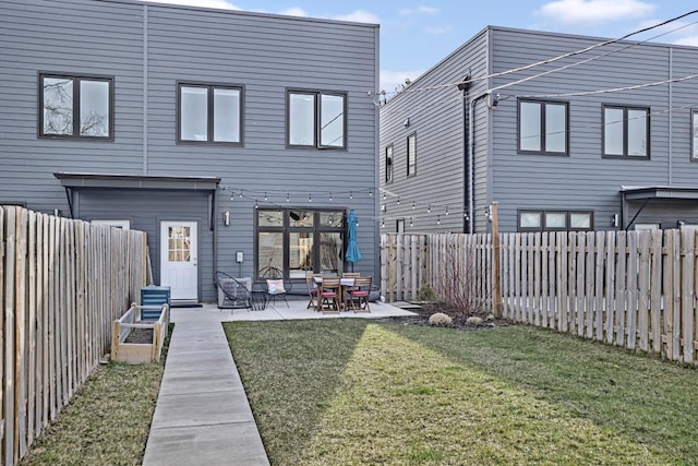 1122 Pitner Ave, Evanston, IL 60202 - back of house featuring a patio area and a fenced backyard