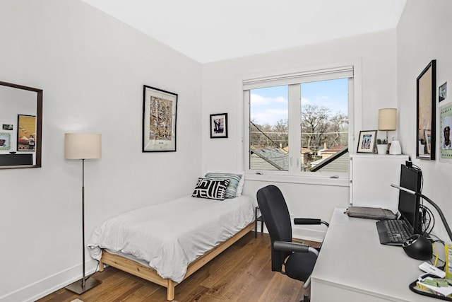 1122 Pitner Ave, Evanston, IL 60202 - bedroom featuring wood finished floors and an office area