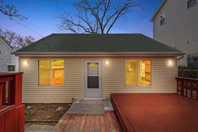 15 N Hillcrest Ave, Fox Lake, IL 60020 - exterior space with a shingled roof and a wooden deck