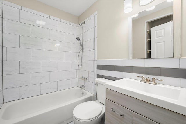 15 N Hillcrest Ave, Fox Lake, IL 60020 - bathroom with vanity, toilet, tile walls, tub / shower combination, and backsplash