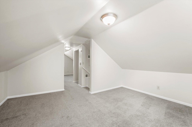 15 N Hillcrest Ave, Fox Lake, IL 60020 - bonus room featuring baseboards, carpet, and vaulted ceiling