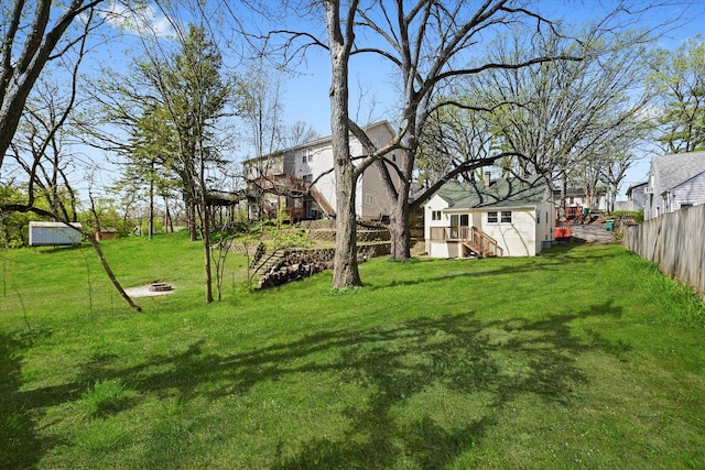 15 N Hillcrest Ave, Fox Lake, IL 60020 - view of yard with fence and an outdoor fire pit
