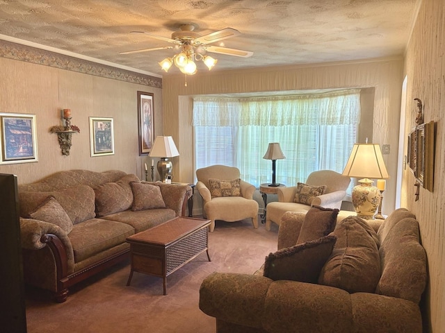 living room featuring carpet flooring and ceiling fan