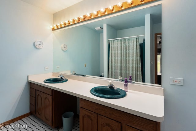 2803 Monterra Dr, Spring Grove, IL 60081 - bathroom featuring double vanity, a shower with shower curtain, and baseboards