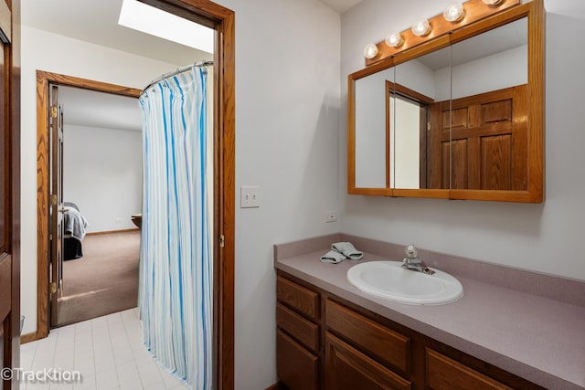 2803 Monterra Dr, Spring Grove, IL 60081 - full bath with vanity, tile patterned flooring, and a skylight