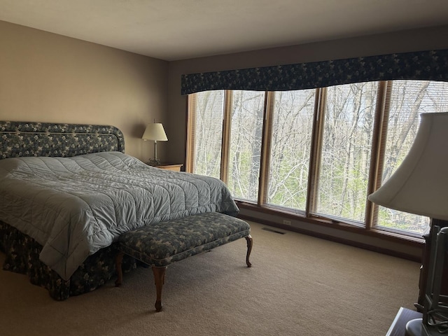 bedroom featuring visible vents and carpet floors
