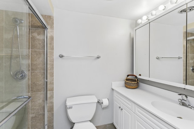 221 N Kenilworth Ave Unit 310, Oak Park, IL 60302 - bathroom with vanity, toilet, and a tile shower