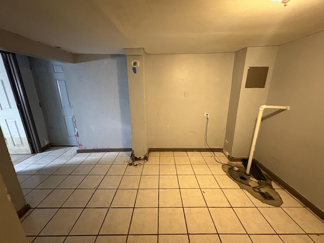 1649 N Latrobe Ave, Chicago, IL 60639 - below grade area featuring baseboards and light tile patterned floors