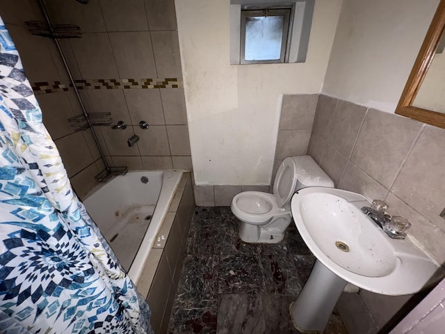 1649 N Latrobe Ave, Chicago, IL 60639 - bathroom featuring a sink, shower / tub combo, toilet, and tile walls
